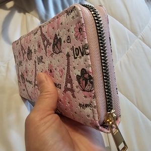 Cute Paris wallet. Pink and sparkles. 8 card slot and space for cash or phone